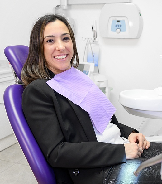 Man sitting on chair with toothache